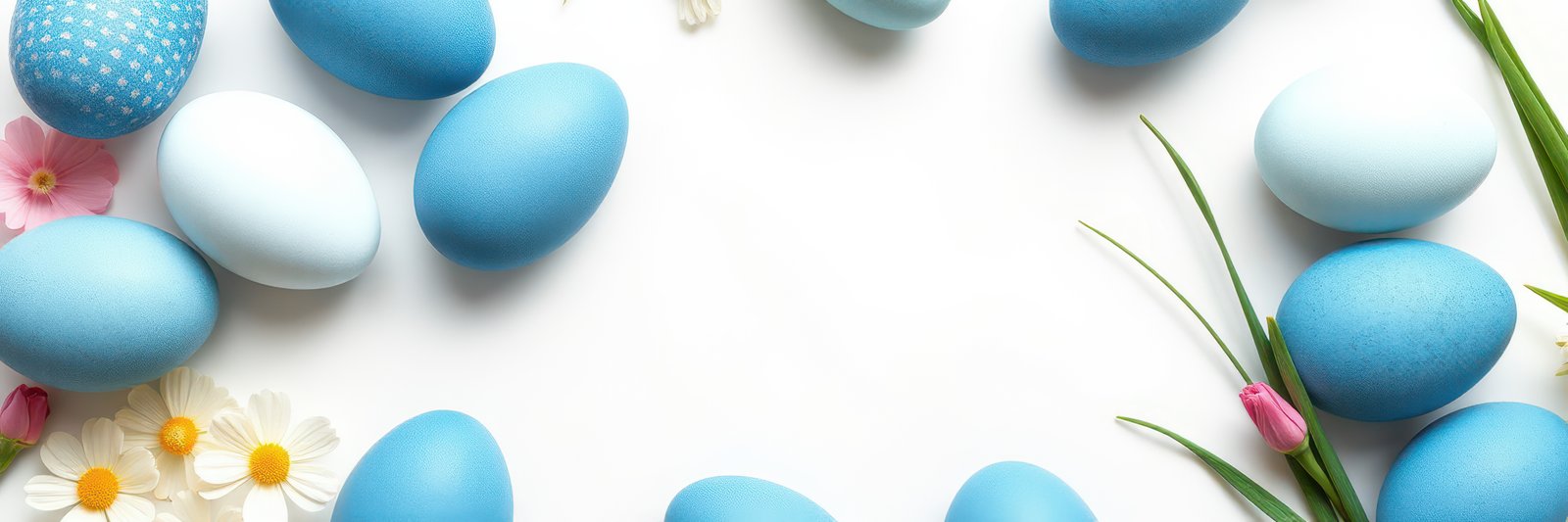Decorative blue Easter eggs arranged with flowers on a white background for spring celebrations